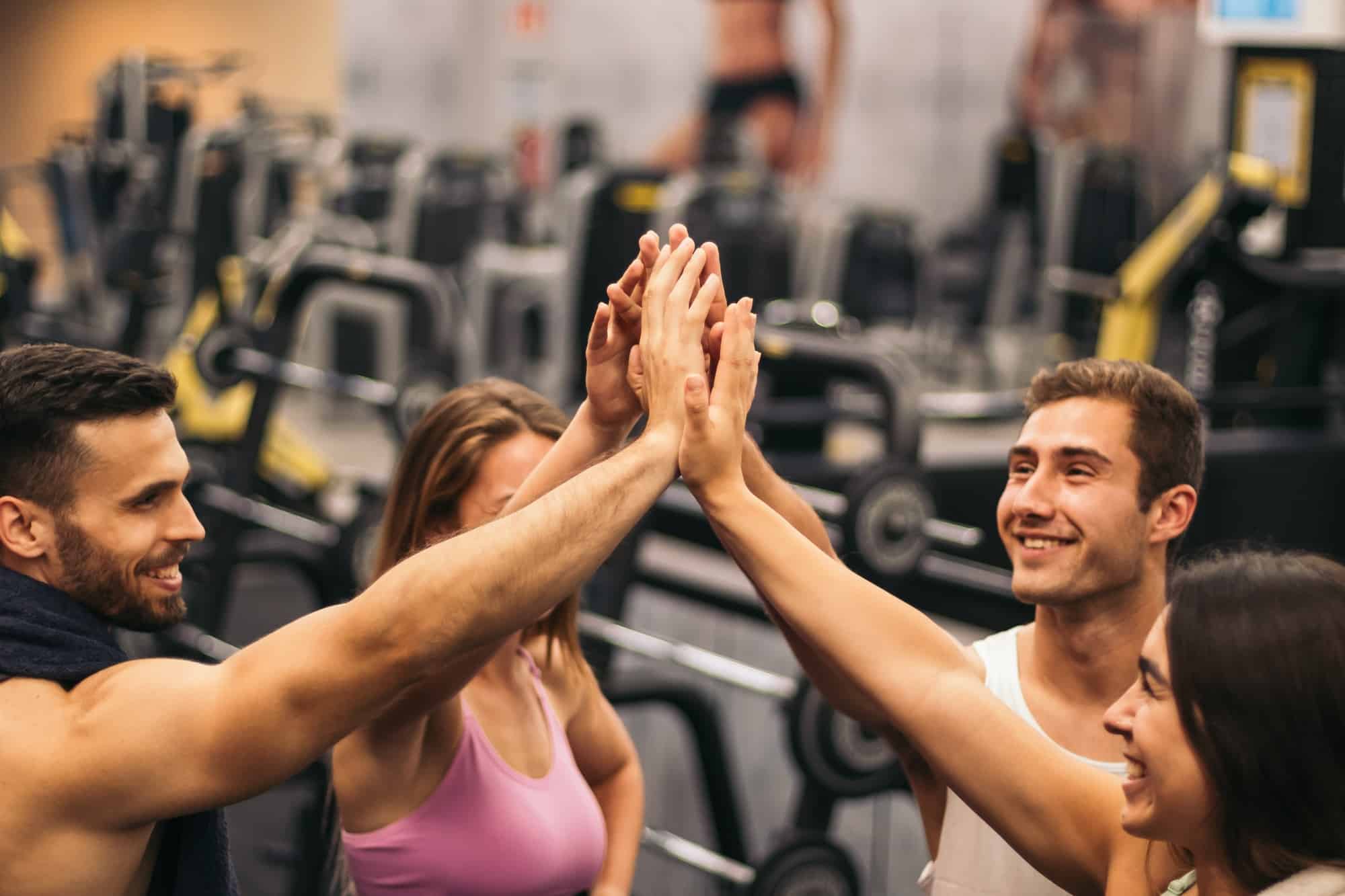 Diboll Fitness Corporate Sponsor | Group Of Friends In A Gym Shaking Hands. Teammates, Unity, Group